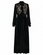 Black kimono with intricate  silk gold and purple embroidery on a white background